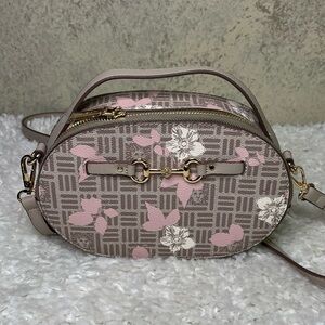 ANNE KLEIN
Leather Oval Crossbody With Floral Overlay